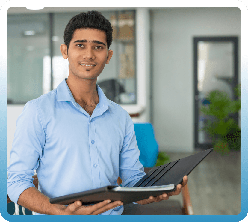 Professional engineer with laptop in office environment